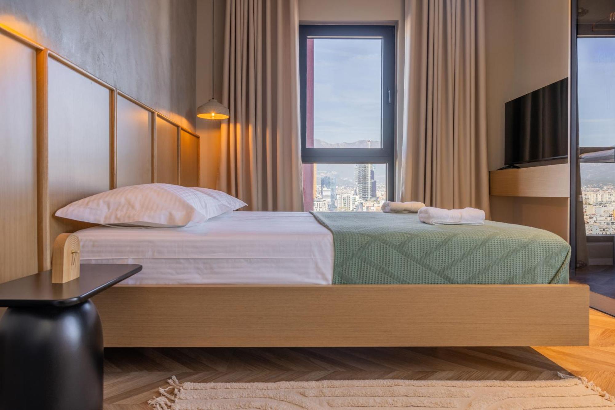 Square Inn Garden Aparthotel 地拉那 外观 照片