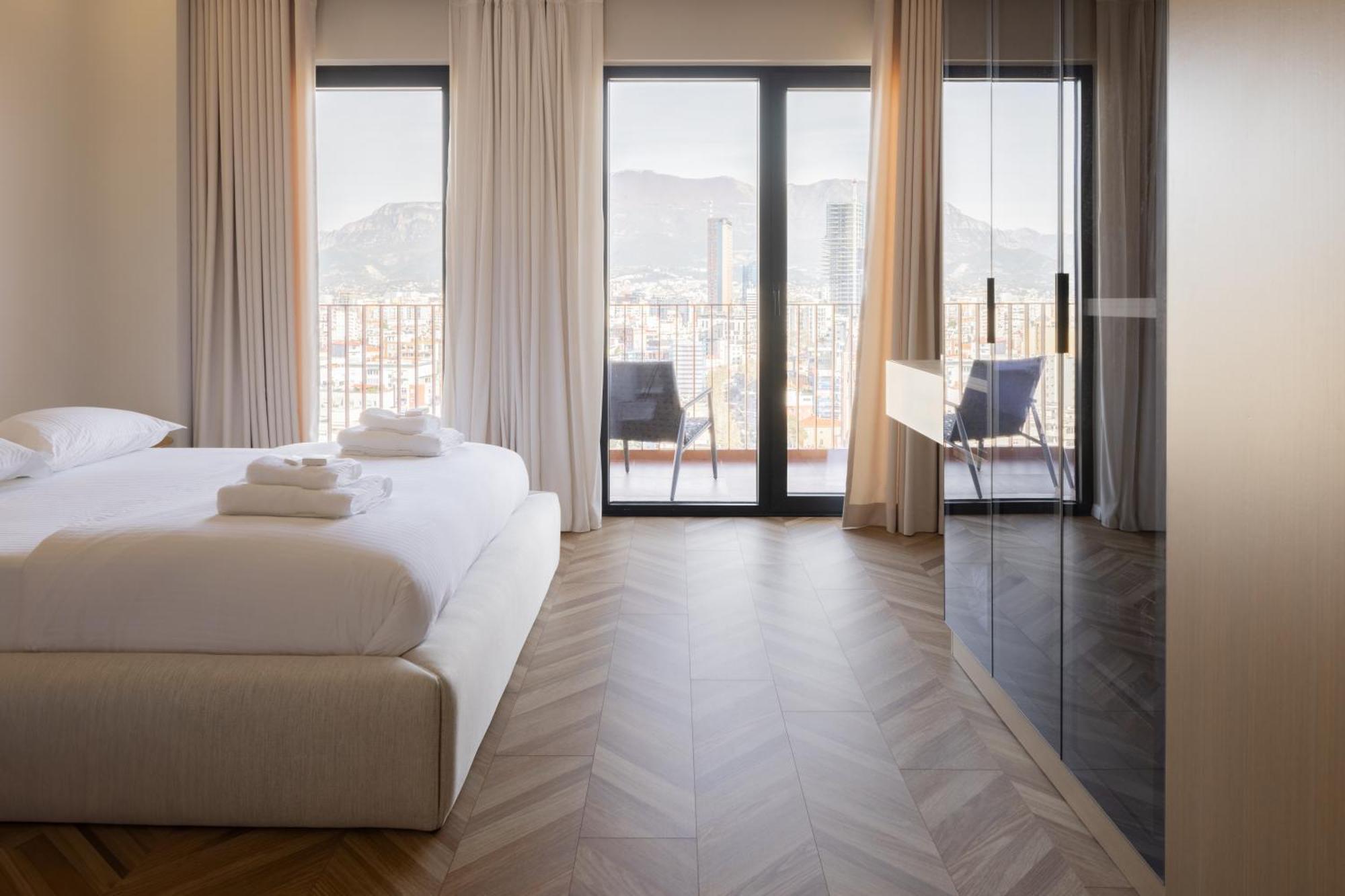 Square Inn Garden Aparthotel 地拉那 外观 照片