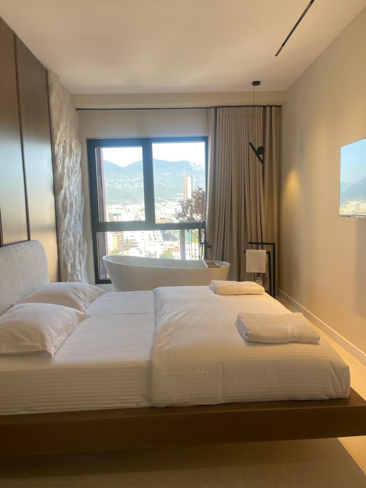 Square Inn Garden Aparthotel 地拉那 外观 照片