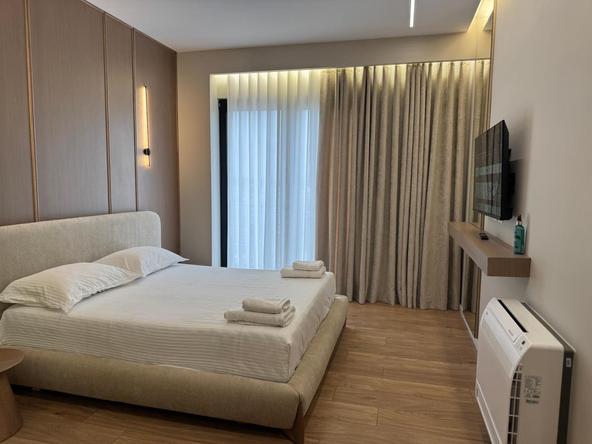 Square Inn Garden Aparthotel 地拉那 外观 照片