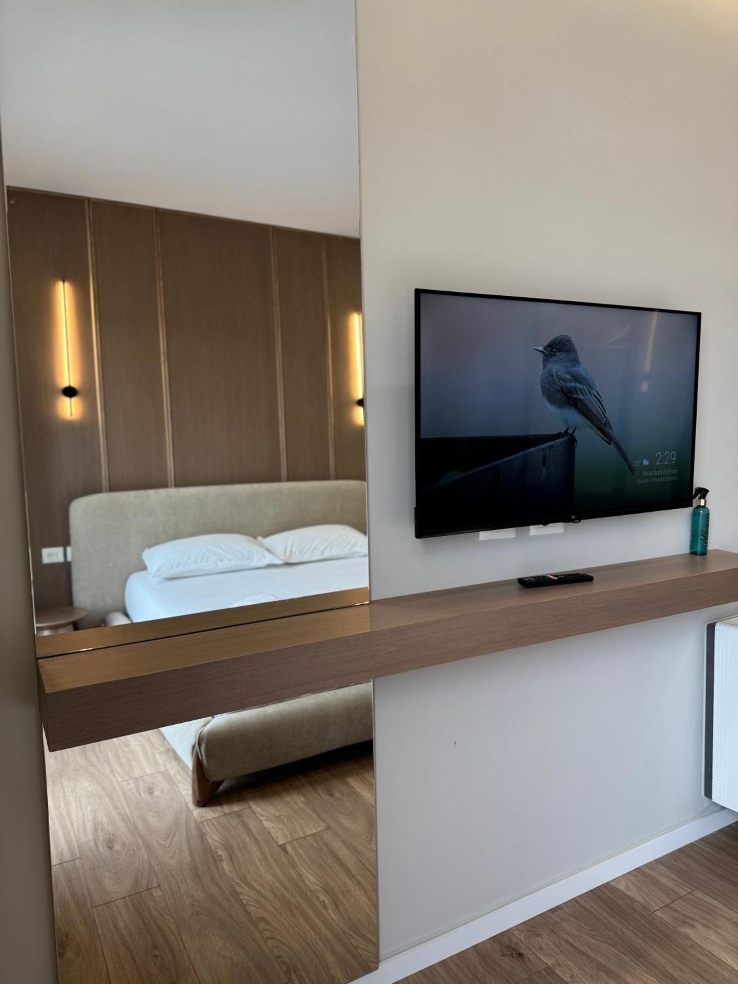Square Inn Garden Aparthotel 地拉那 外观 照片